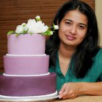 Annie Varghese with Elicia's gorgeous and delicious cake.
